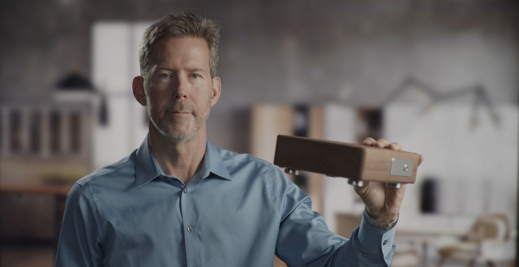Geoff Evans holding a finished walnut Memories Lockbox